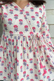 White cotton wrap top with floral pattern