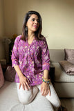 Purple cotton top with floral pattern