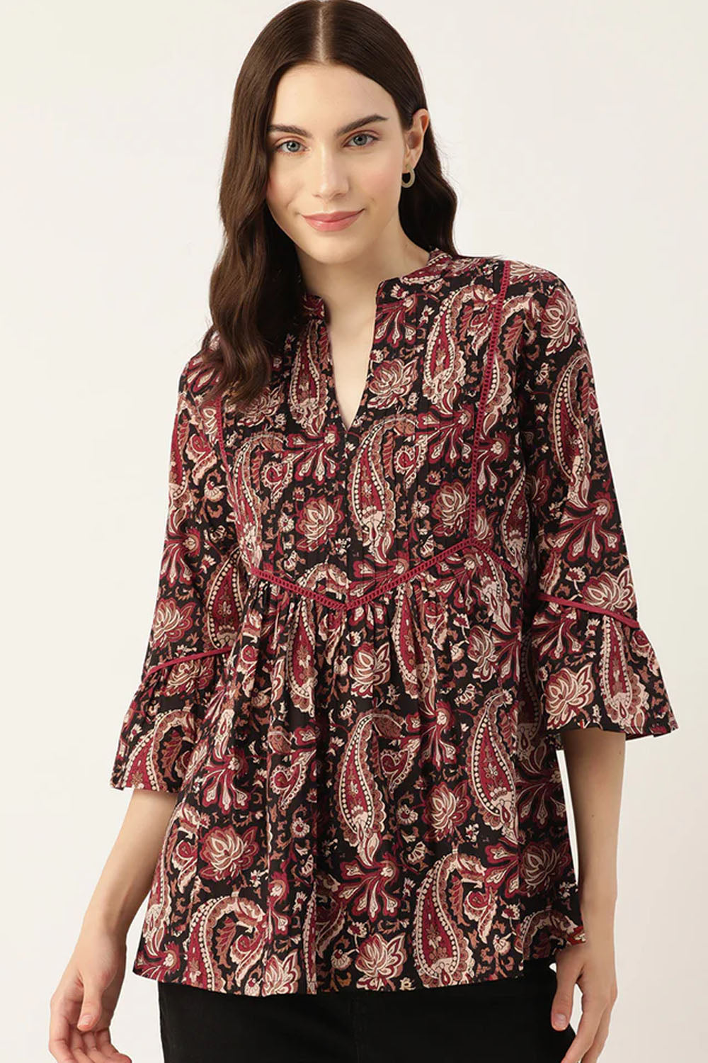 Elegant black top with a traditional royal pattern