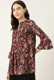 Elegant black top with a traditional royal pattern