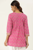 Pink cotton court with traditional Indian ornaments