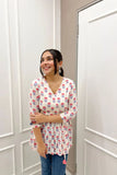 White cotton wrap top with floral pattern
