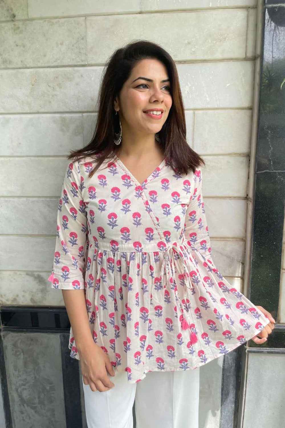 White cotton wrap top with floral pattern