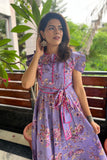 Elegant purple maxi dress with decorative sleeves and belt